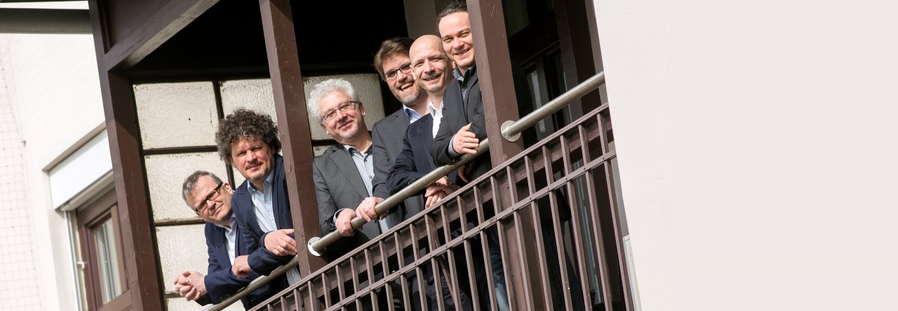 Company History SWC management smiling